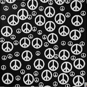 Black background with white peace signs of different sizes to form a patterned surface.