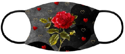 Red rose glows against a background of grunge-style black background of hearts in shades of darker to lighter gray, gold rimmed hearts, and bright red hearts.